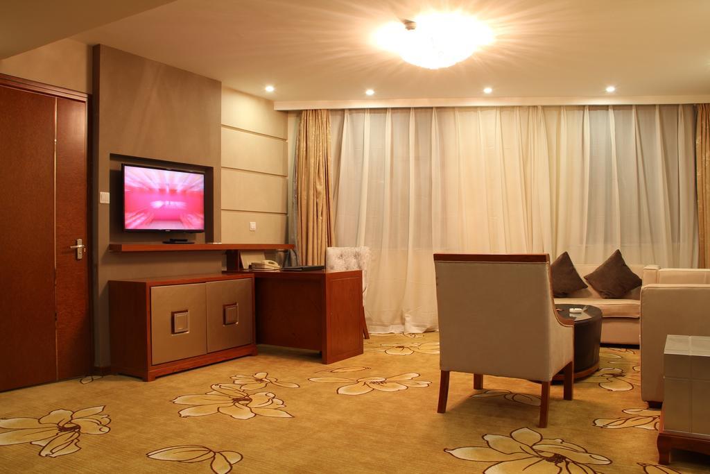 Harbin Victories Hotel Quarto foto